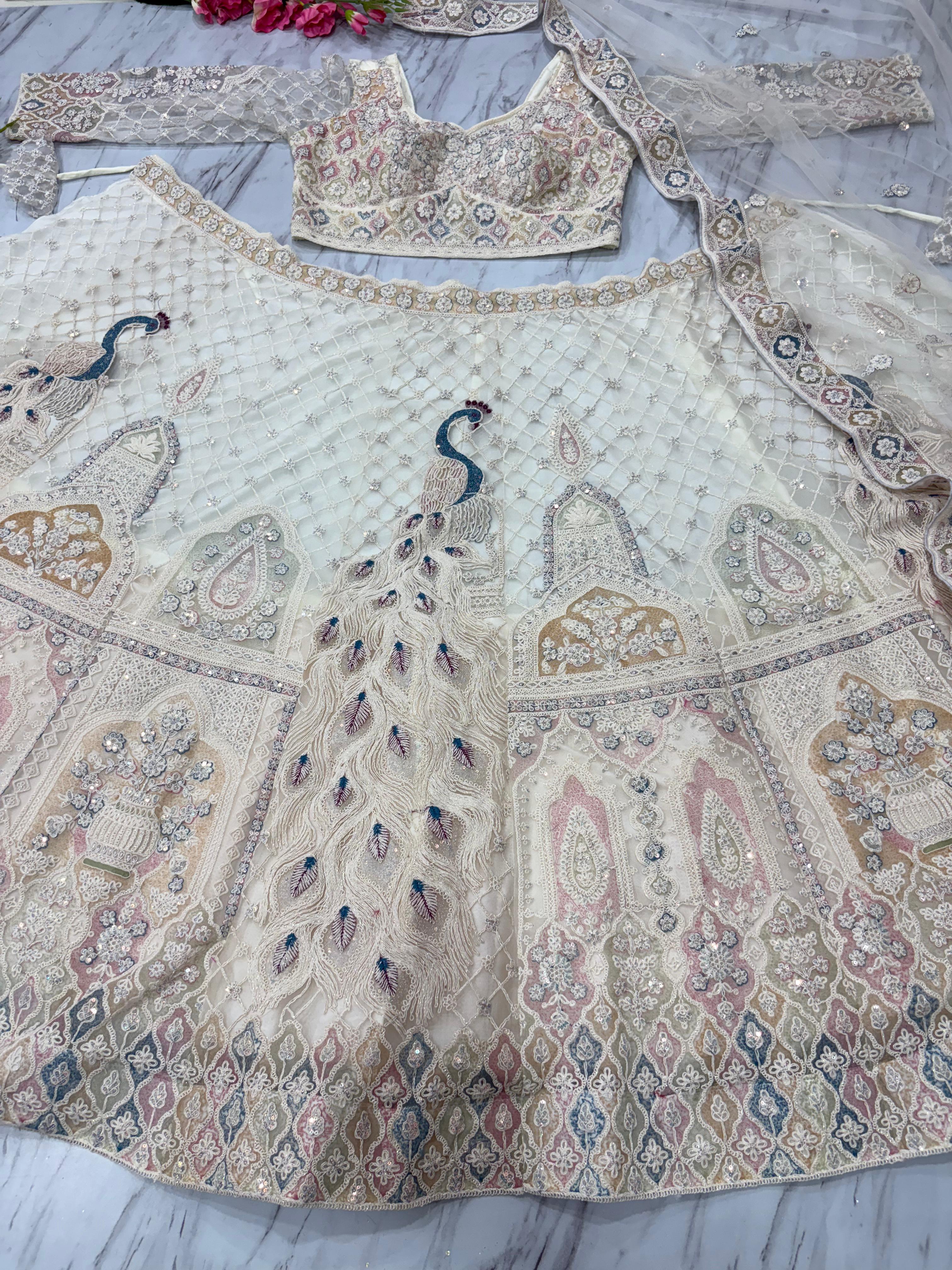 Designer Lehenga Choli With Beautiful Multi Thread Embroidery