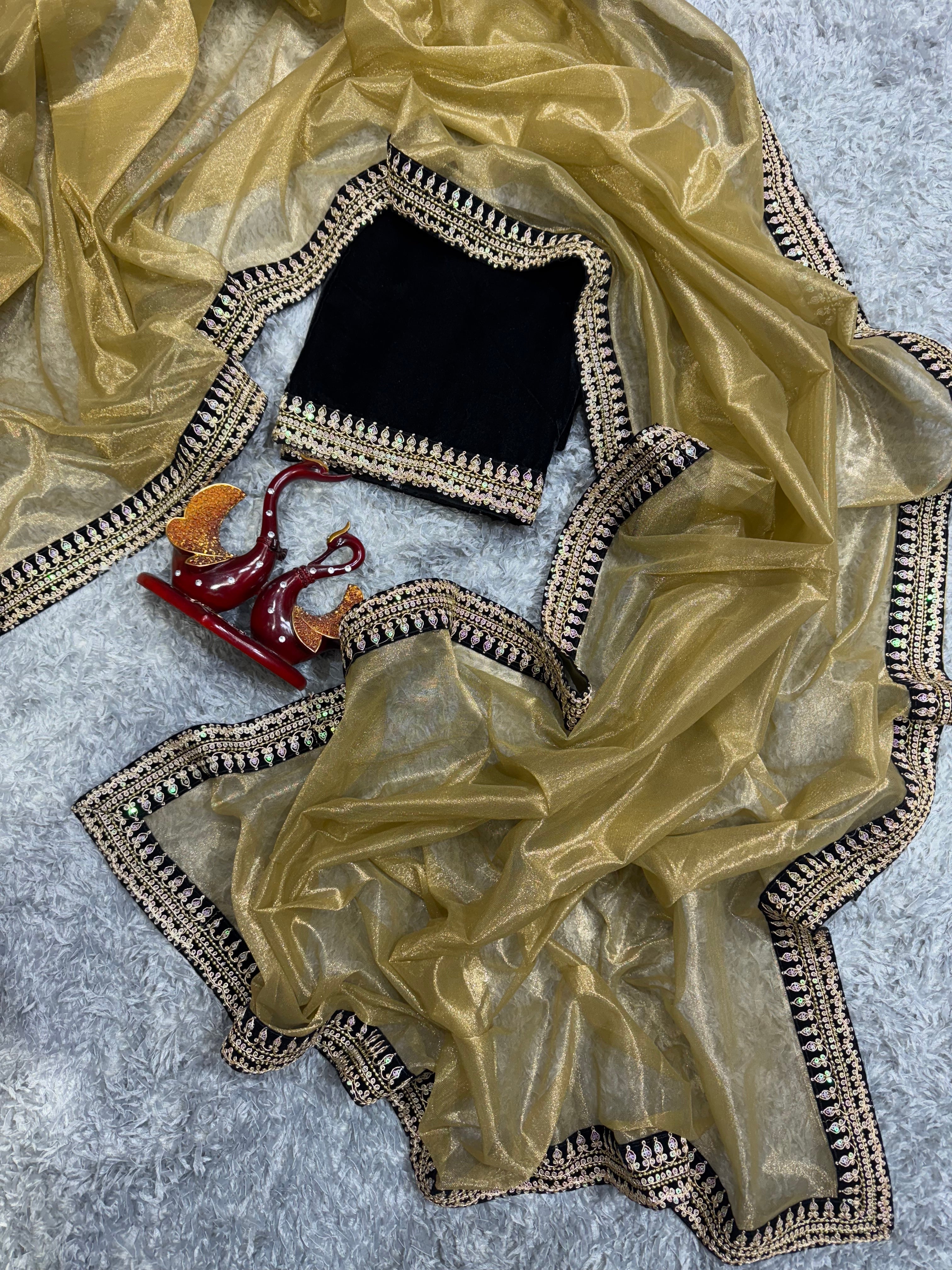 खूबसूरत सीक्वेंस और डोरी कढ़ाई वर्क वाली डिज़ाइनर साड़ी, वेलवेट लेस बॉर्डर के साथ।