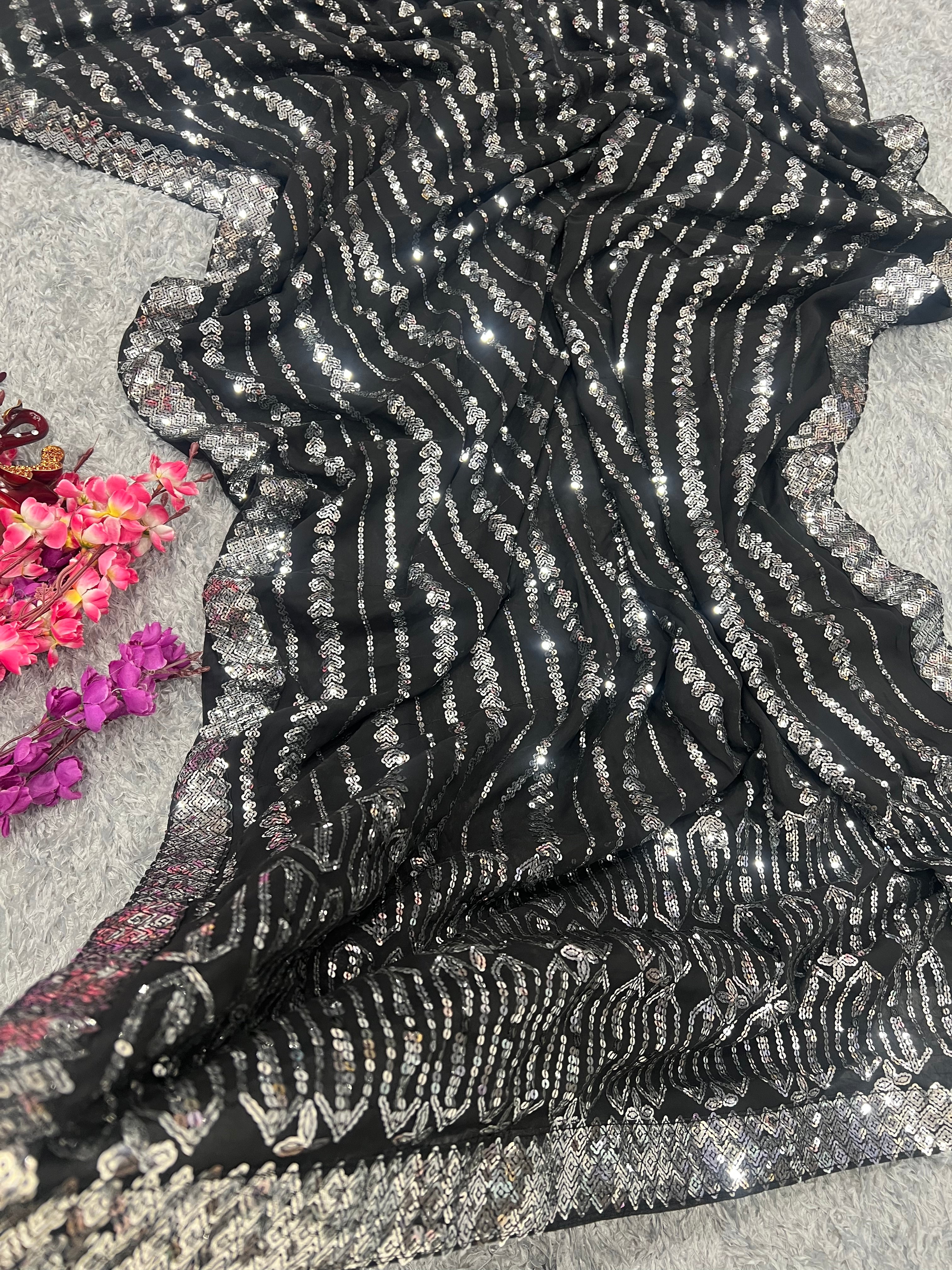 सीक्विन कढ़ाई और लेस बॉर्डर वाली पार्टी वेयर साड़ी 