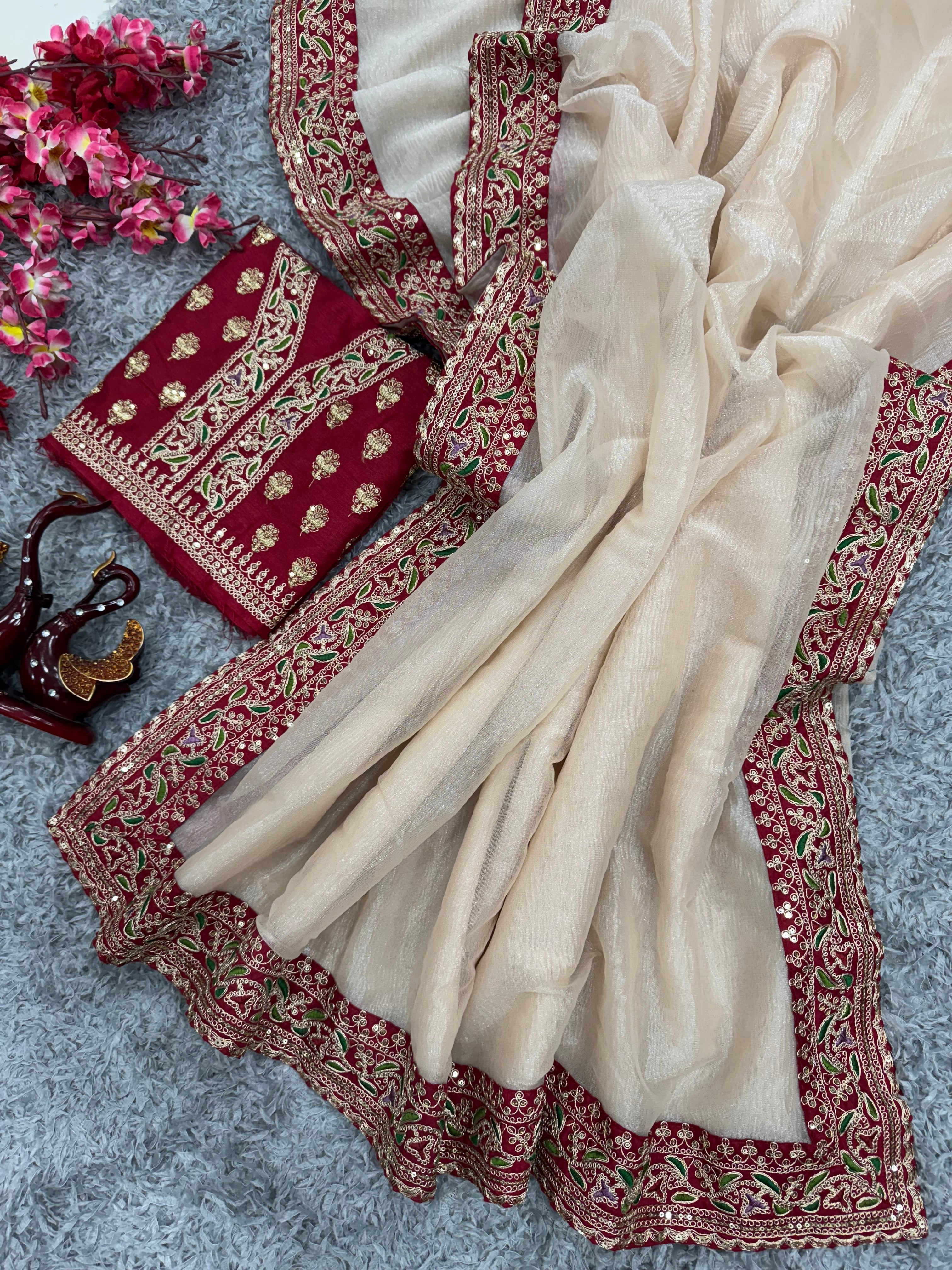 कढ़ाई और लेस बॉर्डर वाली डिज़ाइनर पार्टी वेयर साड़ी