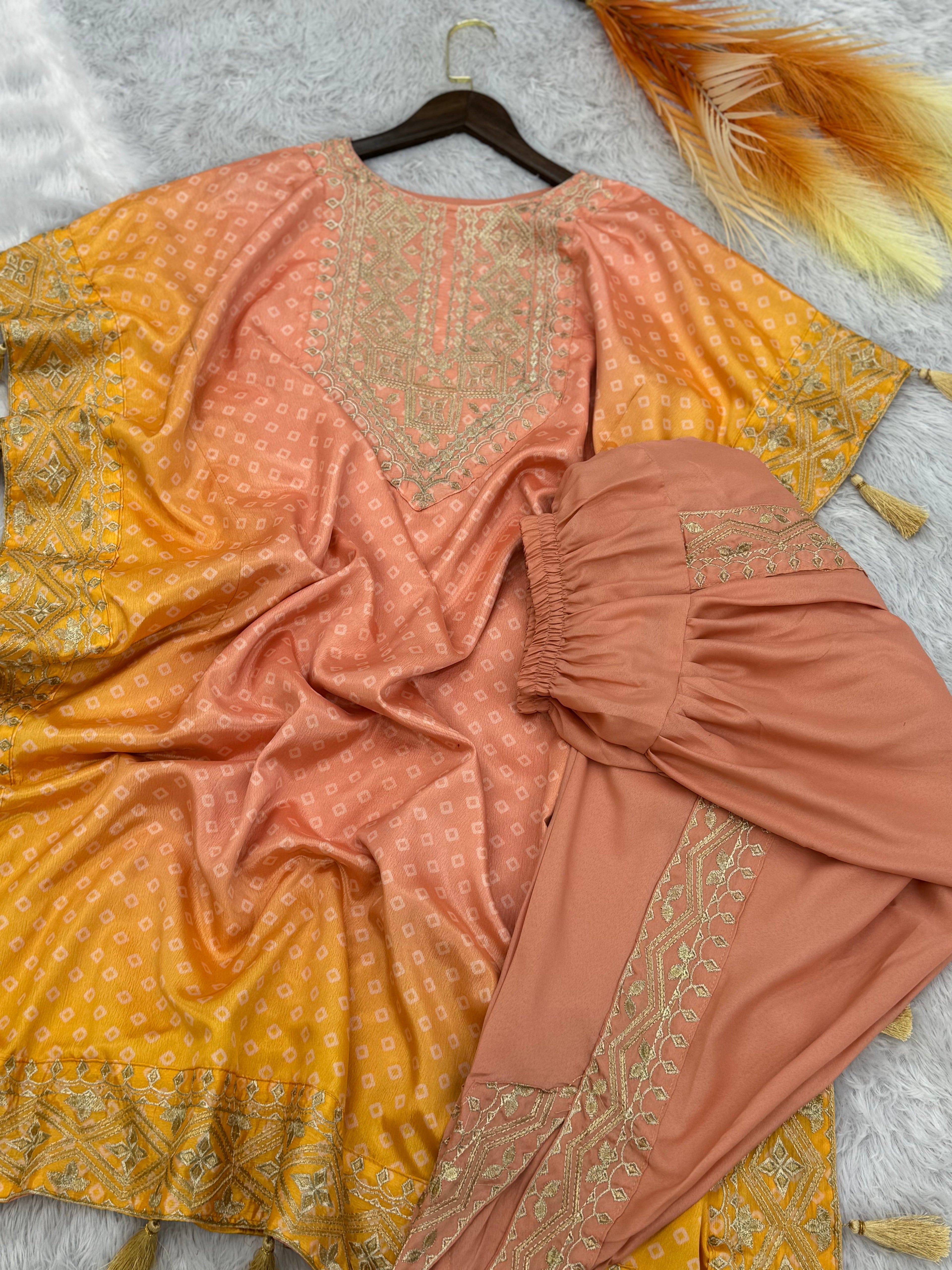 डिजाइनर कफ्तान और धोती पर कढ़ाई और डिजिटल प्रिंट का काम।