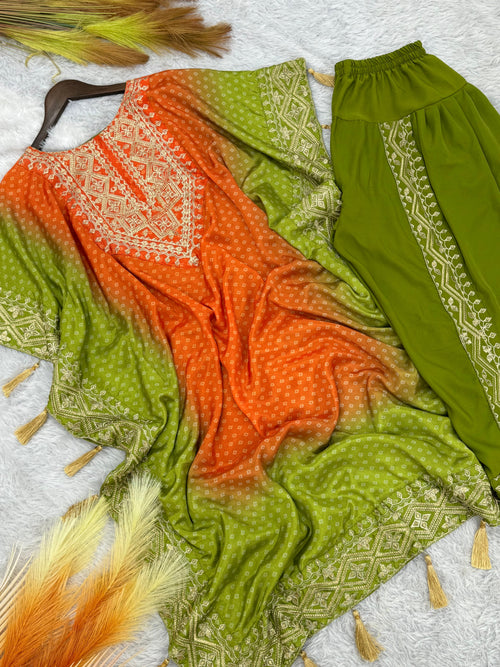 डिजाइनर कफ्तान और धोती पर कढ़ाई और डिजिटल प्रिंट का काम।