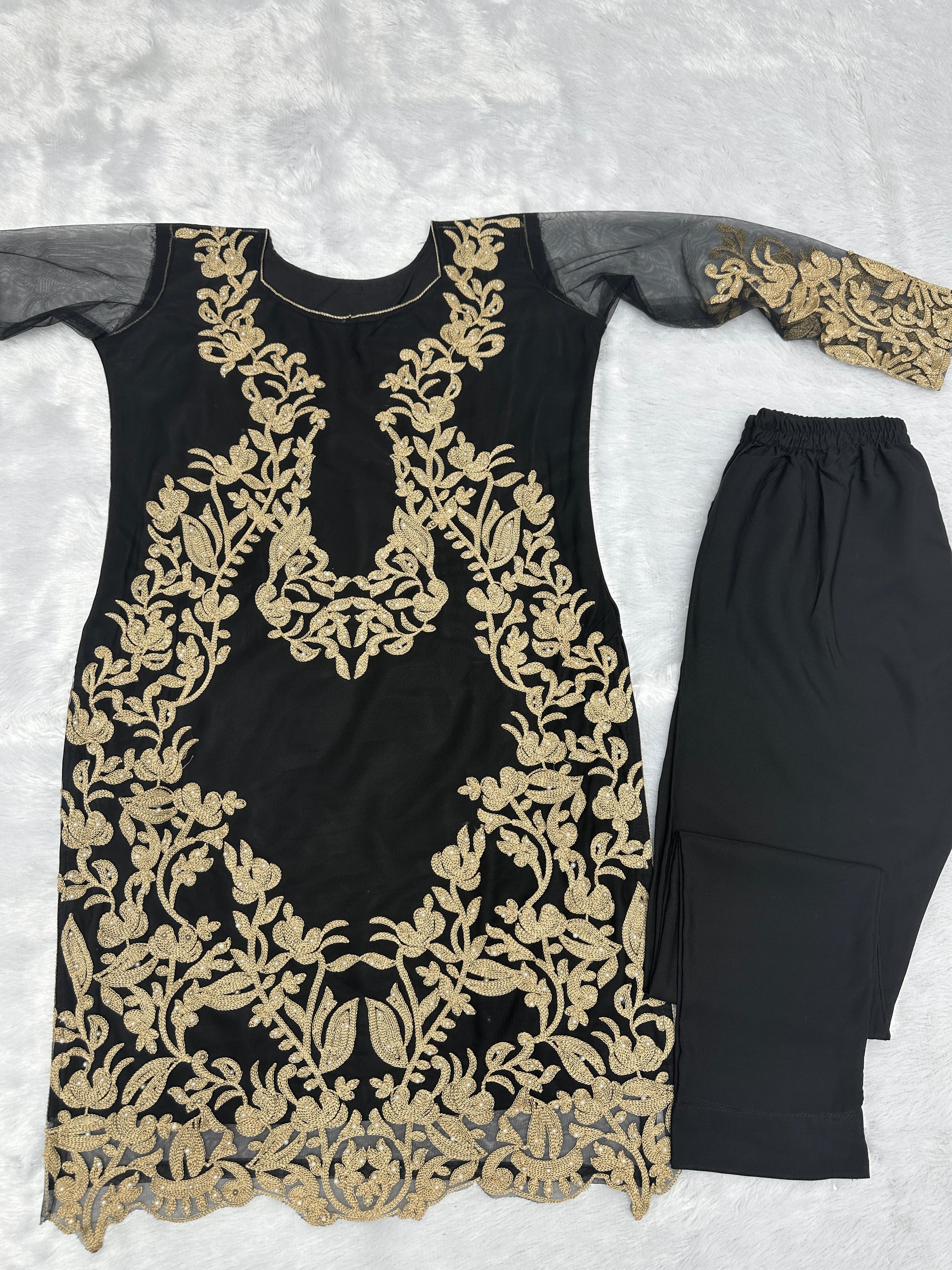 मोती के काम से सजा हुआ खूबसूरत पार्टी वेयर टॉप और बॉटम।